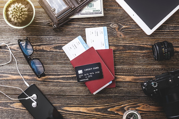 A close-up shot of various forms of identification (driver's license, social security card, passport) laid out on a wooden table, symbolizing the necessary documentation for claiming funds.