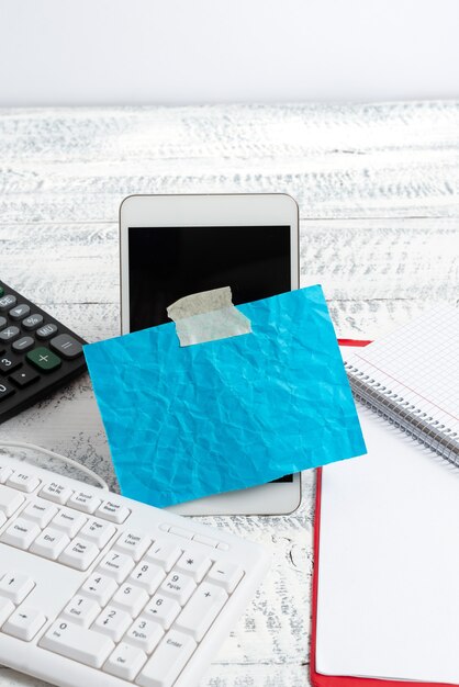 A close-up of a calculator and a stack of documents related to unemployment benefits. The photo emphasizes the financial aspects of unemployment and the importance of careful calculation.