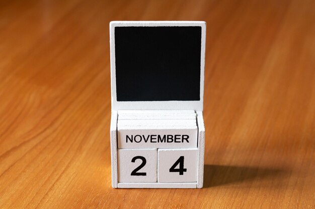 A calendar open to October 2024, with October 1st circled and the words 