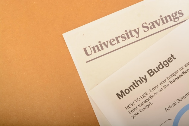 A close-up of a financial aid award letter, with key details like grant amounts, loan offers, and work-study eligibility highlighted with a marker.
