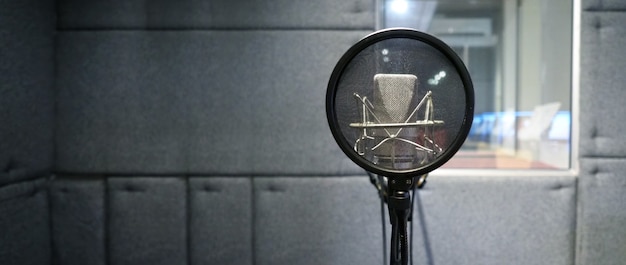 A close-up of a magnifying glass focusing on a stock ticker symbol on a digital screen, emphasizing the need for careful research and diligence when investing in small-cap stocks.