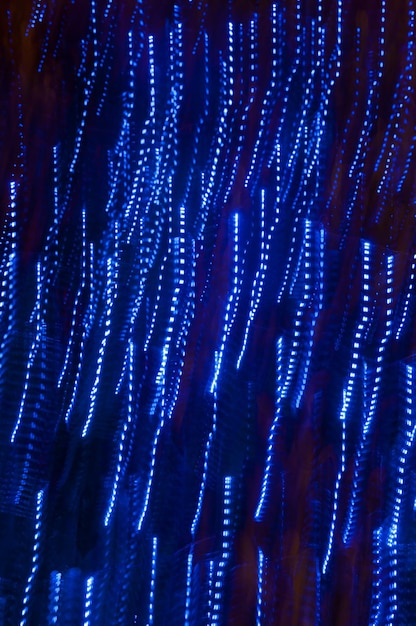 A close-up shot of a microchip with intricate circuit patterns, overlaid with glowing blue lines representing data flow. The image emphasizes the integration of AI technology into hardware components.