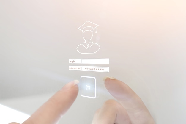 A close-up shot of a hand clicking on the submit button of an online FAFSA form, with a blurred background showing graduation caps.